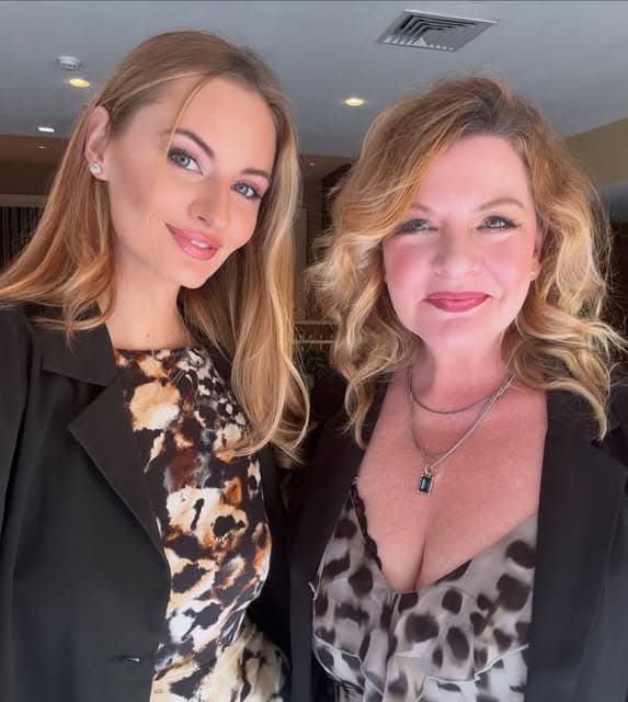 Two women posing for a selfie